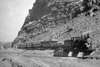 'a_h053 - circa 1930 - Central Australia Railway - NM class engine hauling the Ghan in Heavitree Gap Alice Springs'