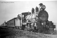 'a_h061 - circa 1930 - Central Australia Railway NM 21 on Limited taking water at Callanna'