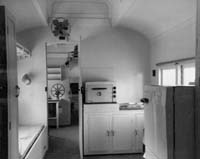 'b02-22a - 1963 - Interior of projection room and crew quarters of "W 144" theatrette car  '