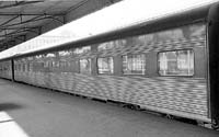 'b08-05a -   - Exterior of Caferteria Car at Adelaide Station. Note the full end concertinas have been removed.(South Australian Railways)'