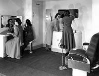   First class sitting car interior showing the women toilet area