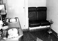   Second class sitting car interior showing the women toilet area