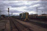 'cd_p0107522 - 10<sup>th</sup> June 1987 - Naracoorte loco 502 hauling freight and sheep vans'