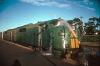 'cd_p0109262 - 27<sup>th</sup> July 1989 - Kalgoorlie station washing GM 41 windscreen'