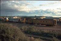 27.4.1992 Spencer Junction - yellow brake van AVDP184 + flat AZSY971 + grey brake AVDP276