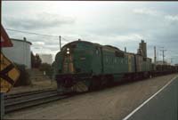 'cd_p0111473 - 27<sup>th</sup> February 1996 - Birkenhead - GM 34 + GM 32 on steel train'