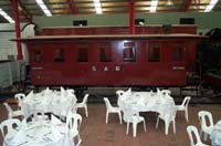 'cd_p1000744 - 21<sup>st</sup> April 2001 - National Railway Museum - Port Adelaide - Car 3 in main pavilion set up for a wedding with tables and chairs.'