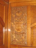 'cd_p1028567 - 9<sup>th</sup> April 2006 - Keswick  Interior SS 44 - Prince of Wales car - lounge area - carved coat of arms panel'