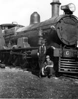 'mbc_06 - 1920's - Joe Harris and Bill Crowe (standing) G 19  Trans line (W.J.Crowe Collection)'