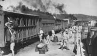 'misc01 - October 1942 - Adelaide River troop train showing converted catle cars and passenger car on North Australia Railway '