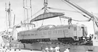 'misca01 - March 1951 - Budd railcar CB 1 being unload from motor vessel <em>Belbetty</em> onto the Port Augusta Wharf'