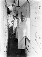 'naa_b3100_nrm1359pd_n - circa 1920s - Kitchen area D class dining car'