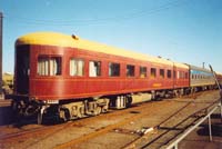 'pda_parlour_car_norman_view_2 - Thursday 2<sup>nd</sup> May 2002 - The Parlour car <em>Norman</em> at Warrnambool. It is seen here as part of the West Coast Railway Warrnambool May Racing Carnival 2003 Warrnambool Cup Race special. This carriage was built exclusively for use on the Spirit Of Progress in 1937, it is now available for hire by the general public for use on Special trains on the broad gauge. <p>West Coast Railway is the only mainline operator in Victoria that still run race trains to racing carnivals, Race trains where once a common occurrence to grace the Victorian Railways tracks but now except for the Warrnambool line, the race train is now a thing of the past.'