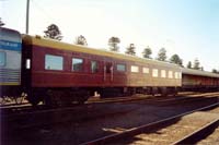 'pda_parlour_car_norman_view_6 - Thursday 2<sup>nd</sup> May 2002 - The Parlour car <em>Norman</em> at Warrnambool. It is seen here as part of the West Coast Railway Warrnambool May Racing Carnival 2003 Warrnambool Cup Race special. This carriage was built exclusively for use on the Spirit Of Progress in 1937, it is now available for hire by the general public for use on Special trains on the broad gauge. <p>West Coast Railway is the only mainline operator in Victoria that still run race trains to racing carnivals, Race trains where once a common occurrence to grace the Victorian Railways tracks but now except for the Warrnambool line, the race train is now a thing of the past.'