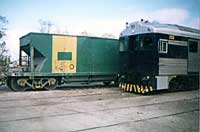 'pm_bluebird-6 - May 1998 - 252 crosses ASR's limestone train at Nurriootpa.'
