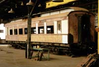 'sg38 -   - Lounge car AF 24 in workshop at Steamtown Peterborough. '